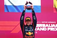 Red Bull's Max Verstappen holding the first-place trophy for winning the 2025 F1 Grand Prix of Azerbaijan - Source: Getty